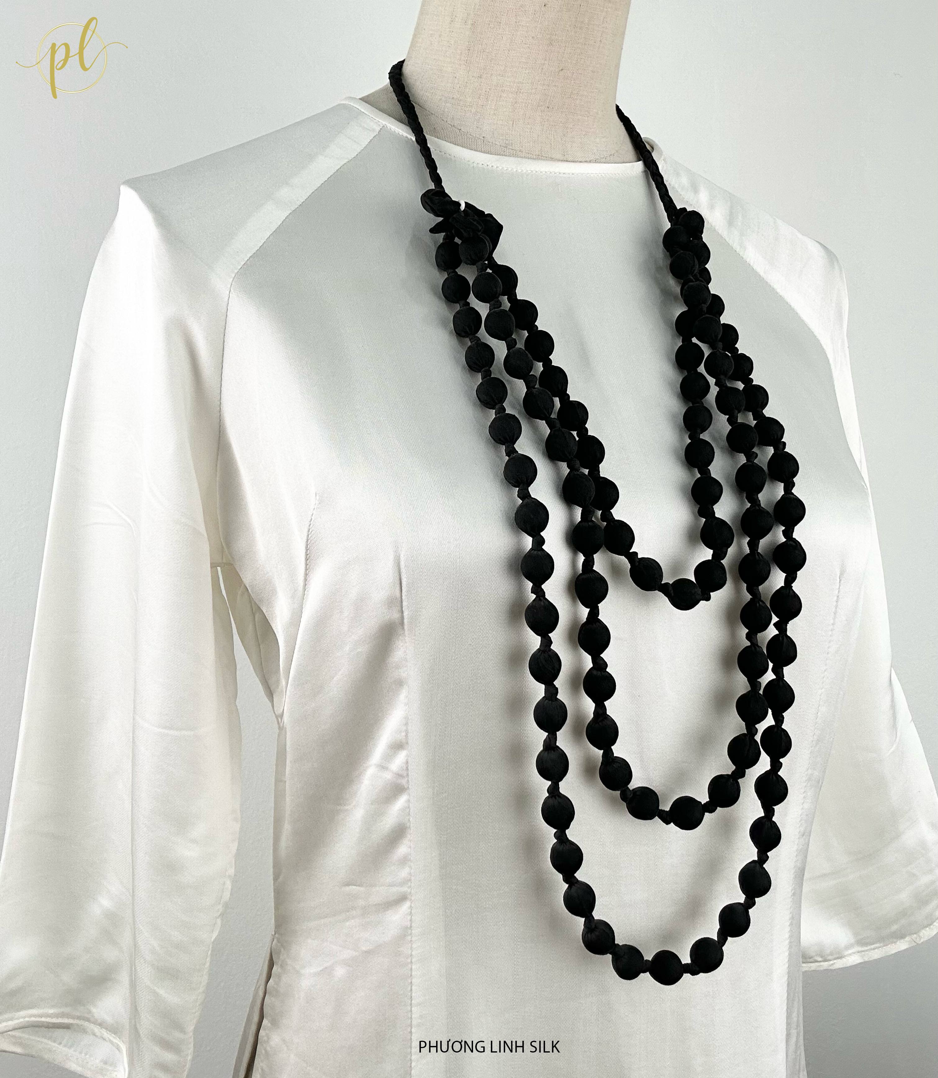 VÒNG HẠT GỖ TẾT NƠ BỌC LỤA TƠ TẰM