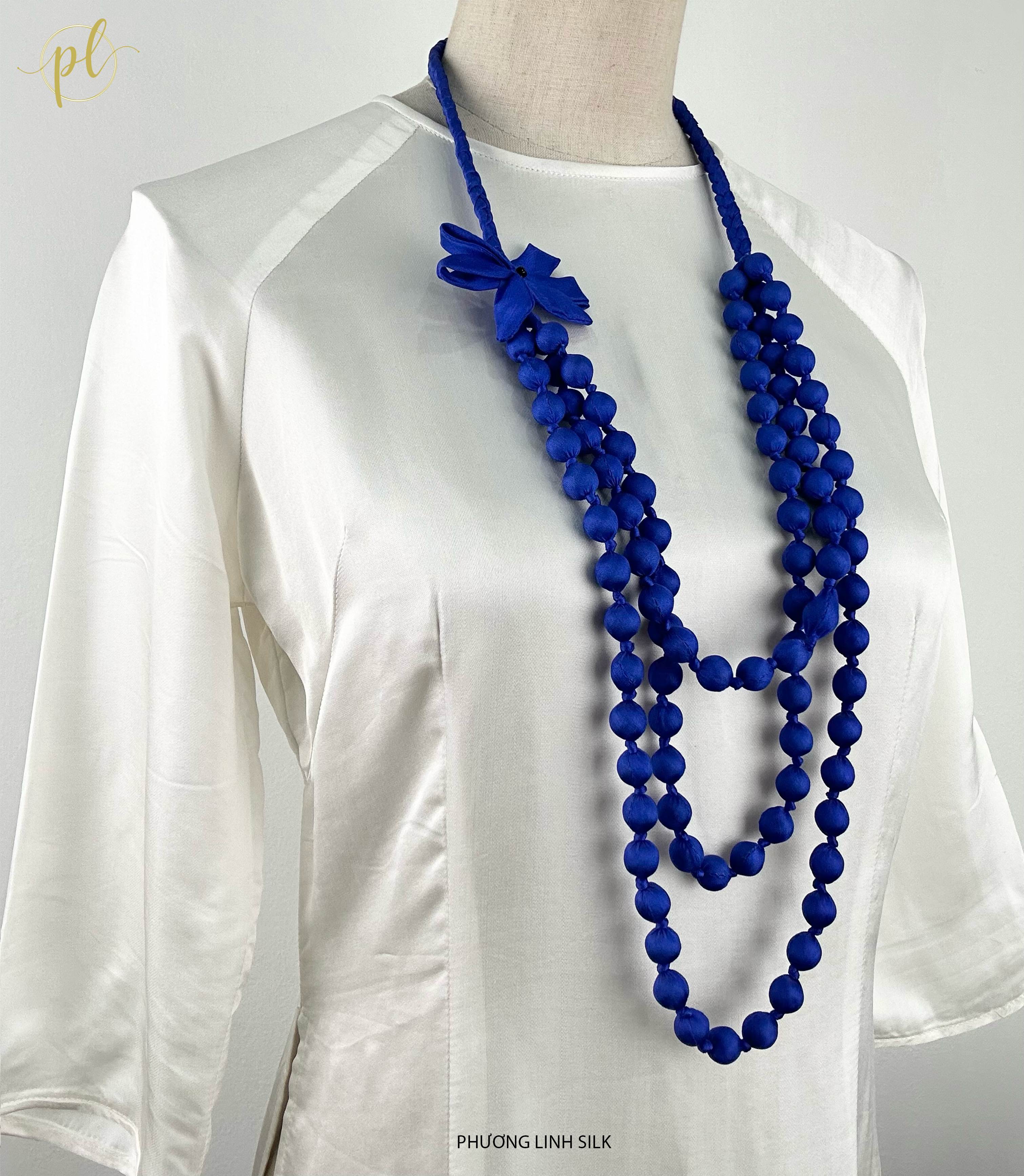 VÒNG HẠT GỖ TẾT NƠ BỌC LỤA TƠ TẰM