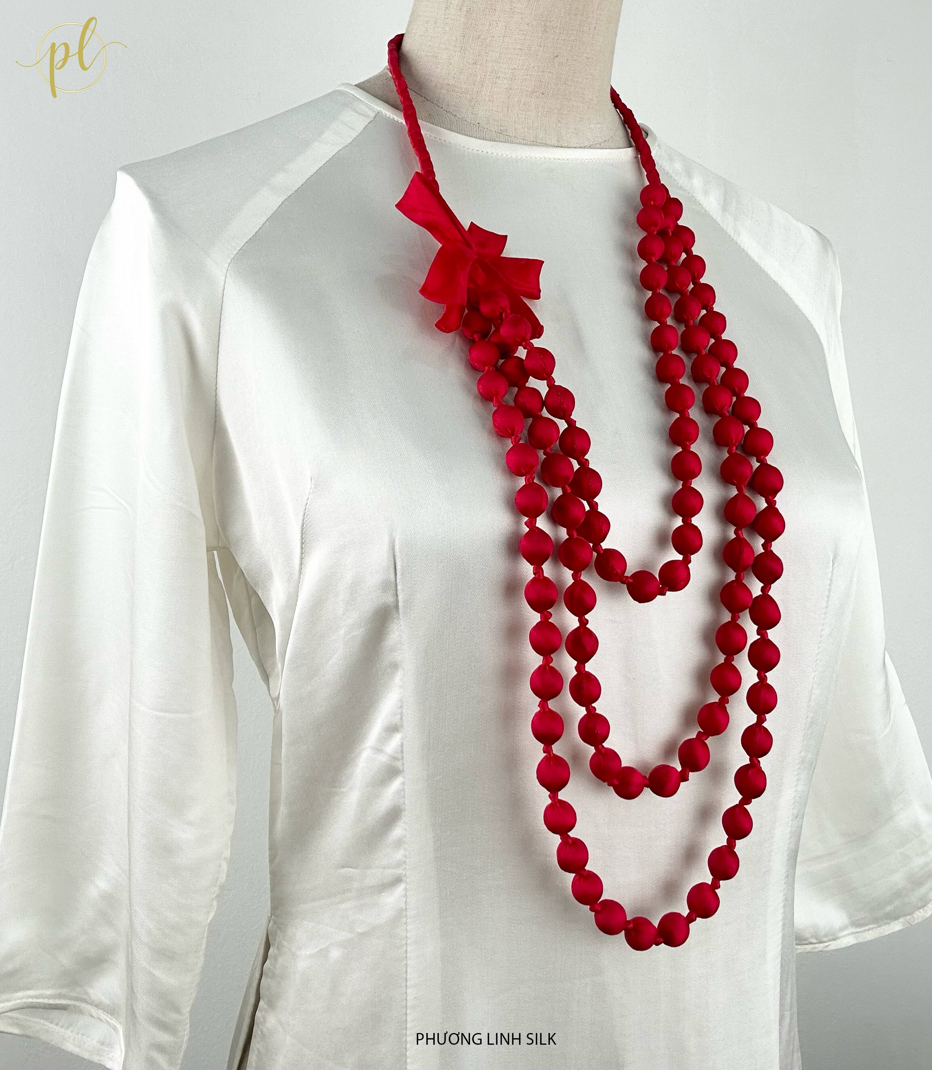 VÒNG HẠT GỖ TẾT NƠ BỌC LỤA TƠ TẰM