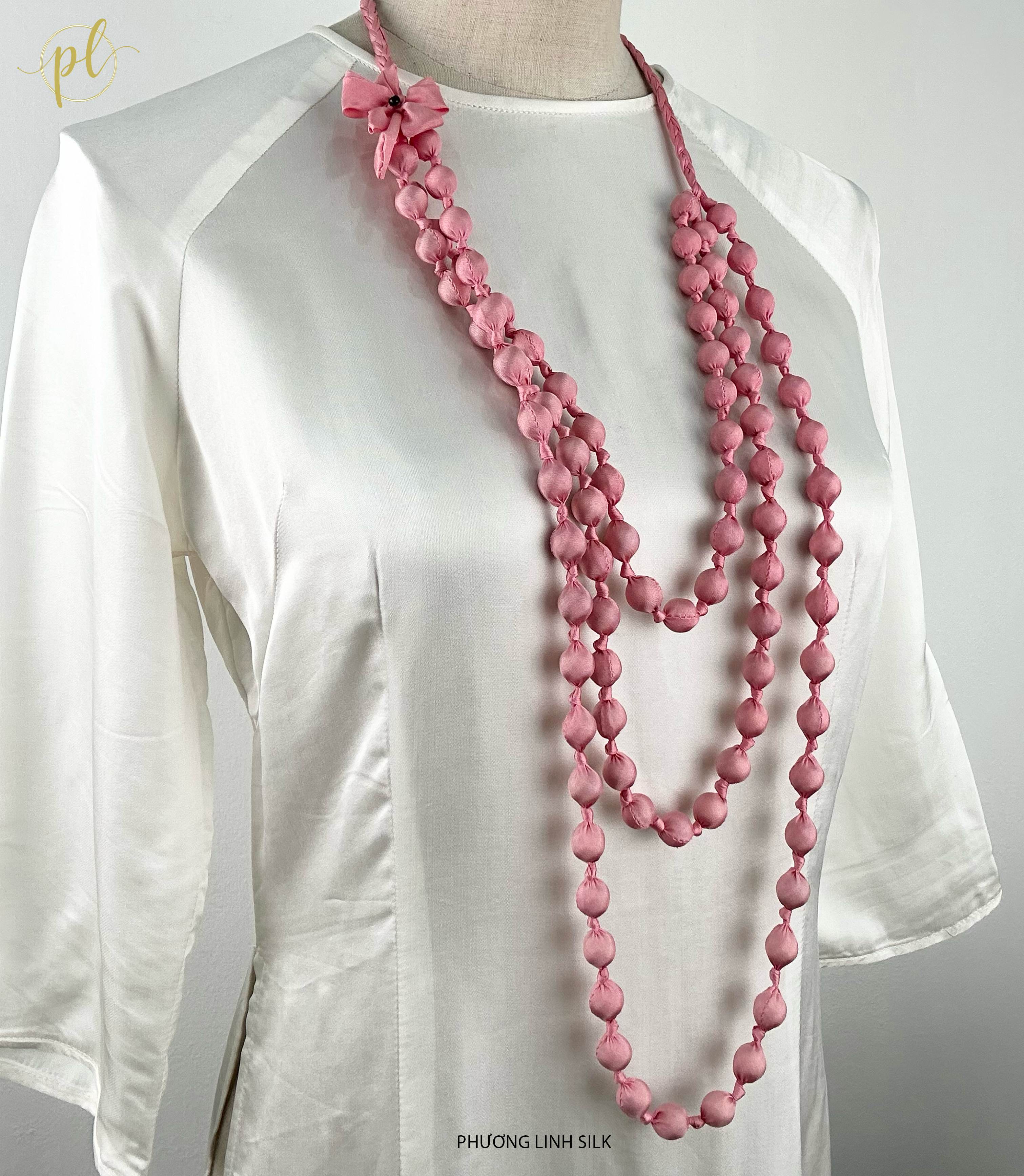 VÒNG HẠT GỖ TẾT NƠ BỌC LỤA TƠ TẰM