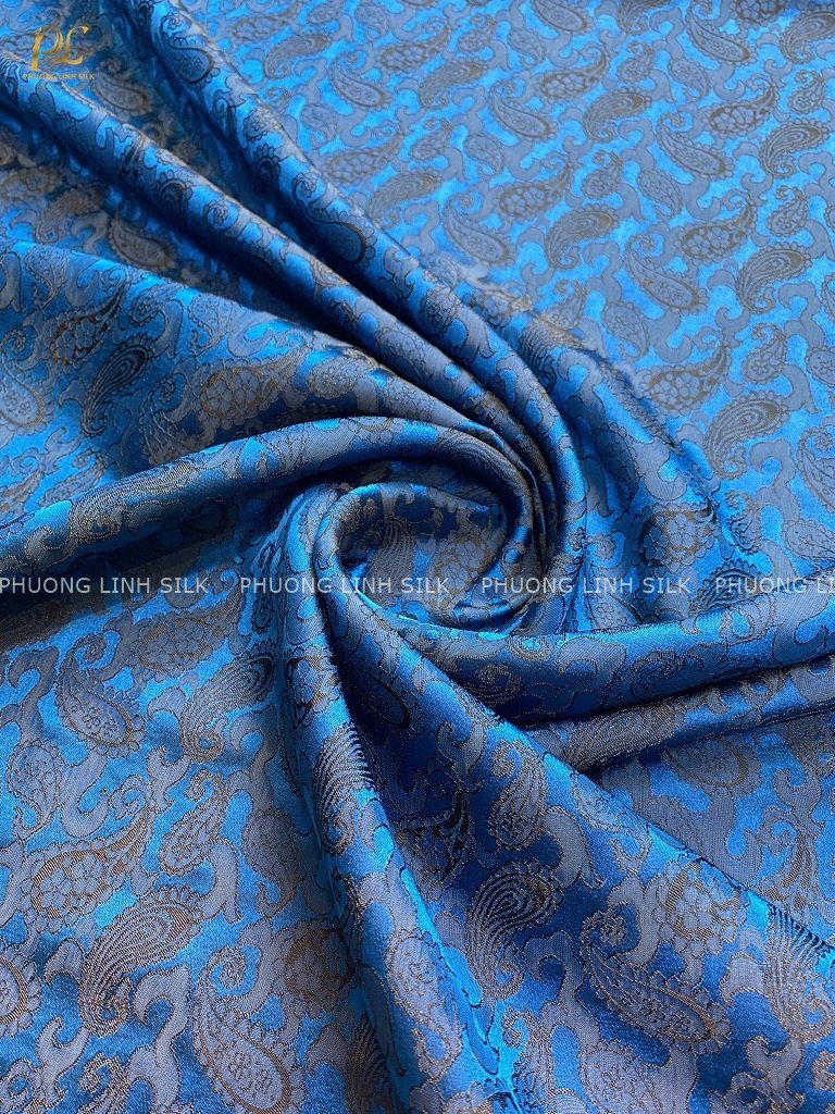VẢI LỤA SATIN TƠ TẰM ĐUÔI CÔNG MÀU XANH CỔ VỊT