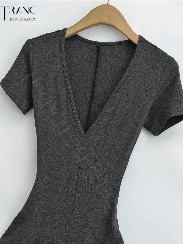 ĐẦM ÔM BODY DÁNG DÀI CỔ CHỮ V NHẤN EO