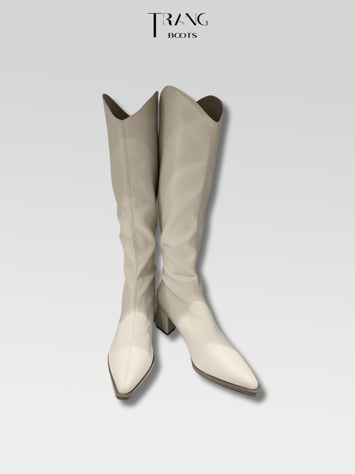 GIÀY BOOTS GỐI CAO BỒI CỔ CHỮ V