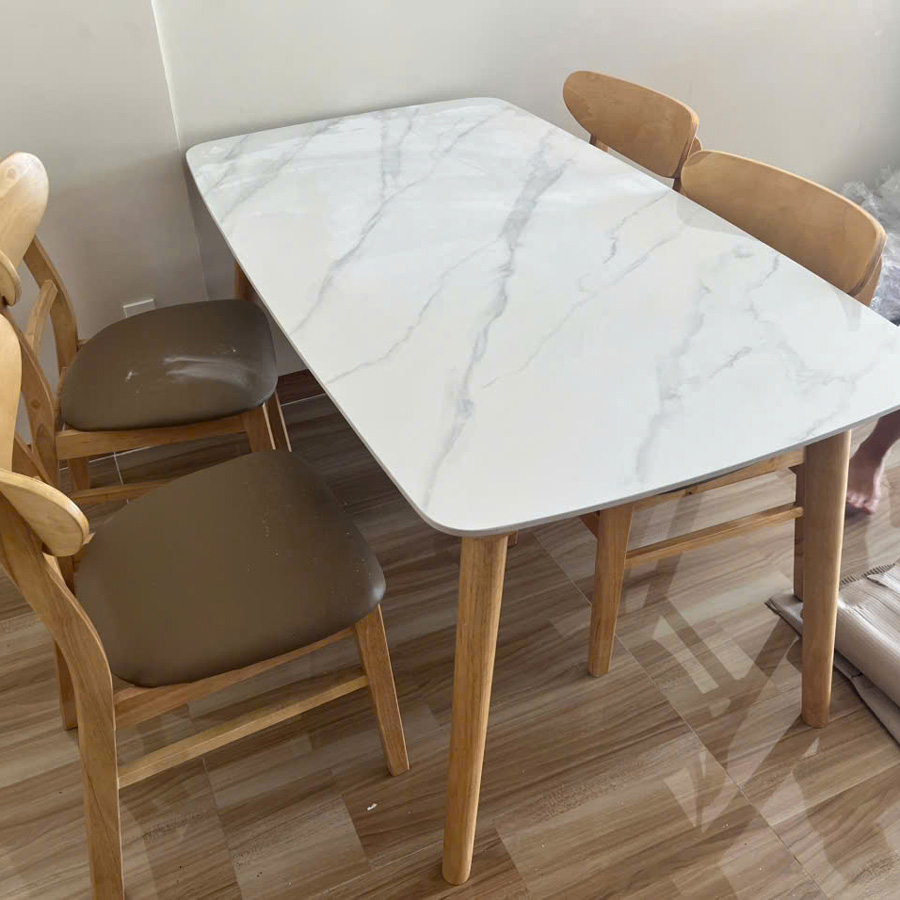 Bàn ăn mặt đá ceramic trắng vân mây