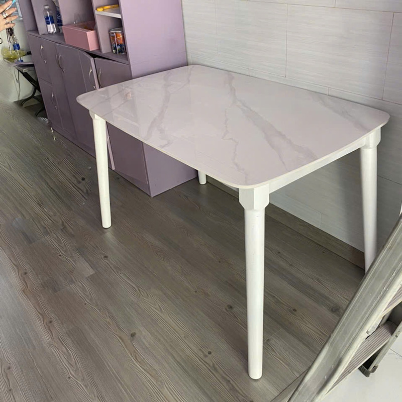 Bàn ăn mặt đá ceramic trắng vân mây