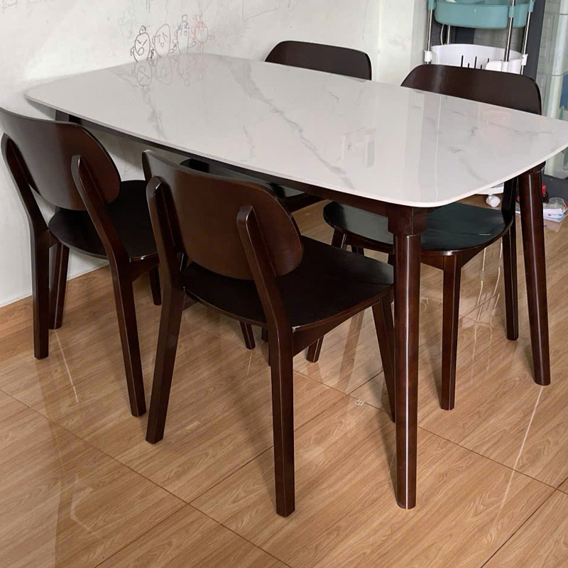 Bàn ăn mặt đá ceramic trắng vân mây