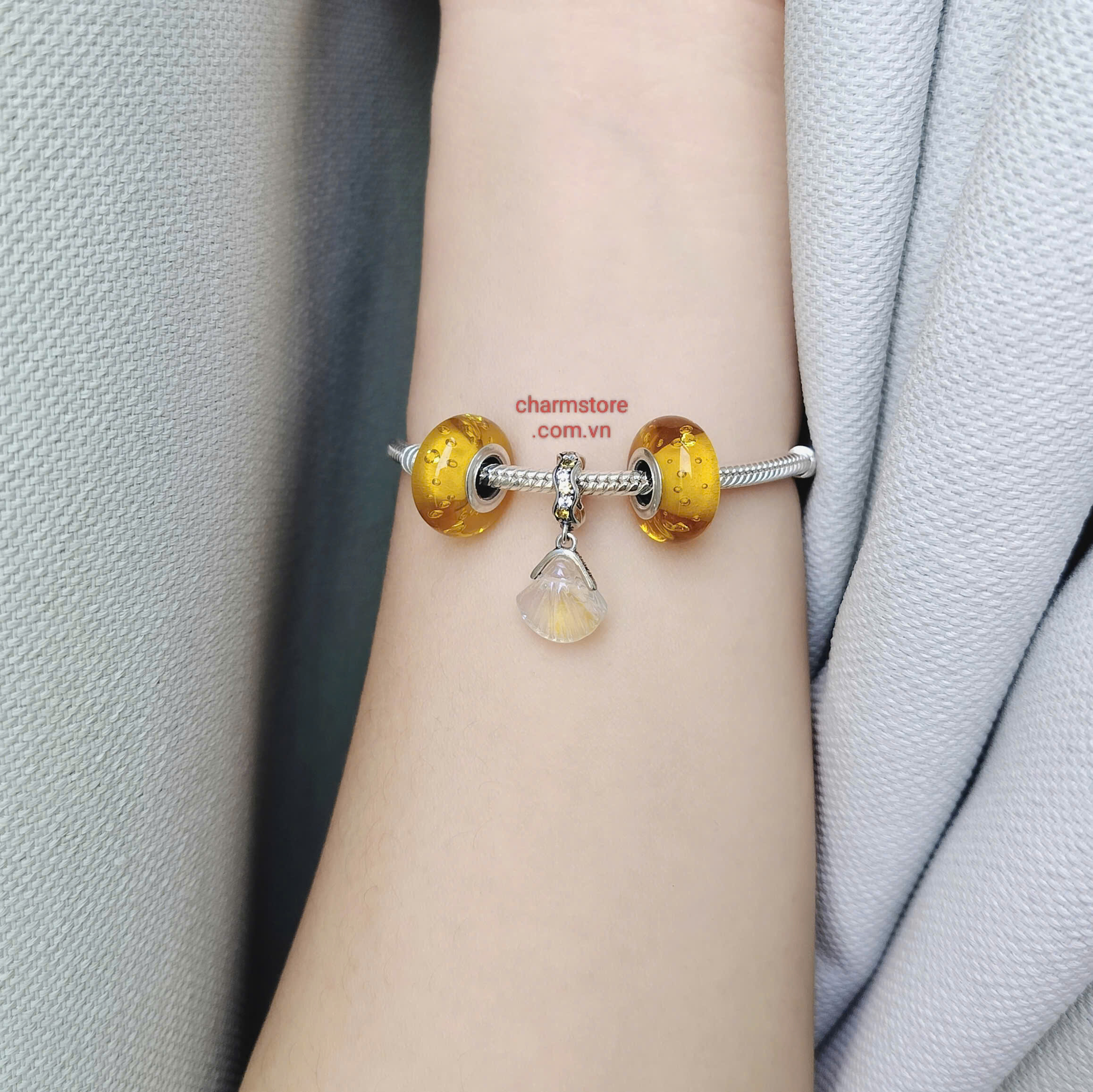 VÒNG CHARM MỆNH THỔ TREO SÒ BỌT BIỂN VÀNG