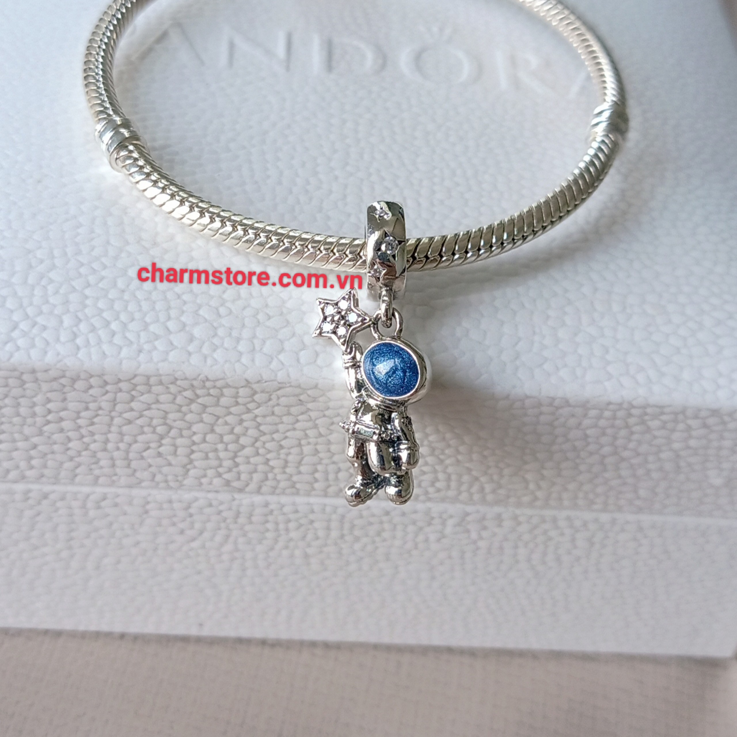 CHARM TREO PHI HÀNH GIA XD