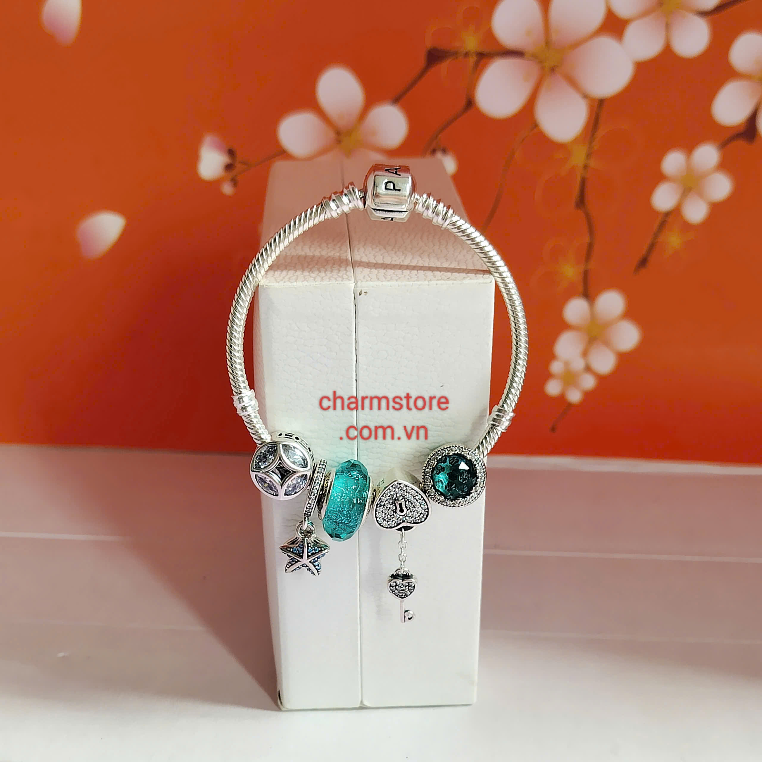 VÒNG CHARM TÀI LỘC MỆNH THỦY - KIM TIỀN MIX ĐÁ XANH NGỌC TREO SAO BIỂN