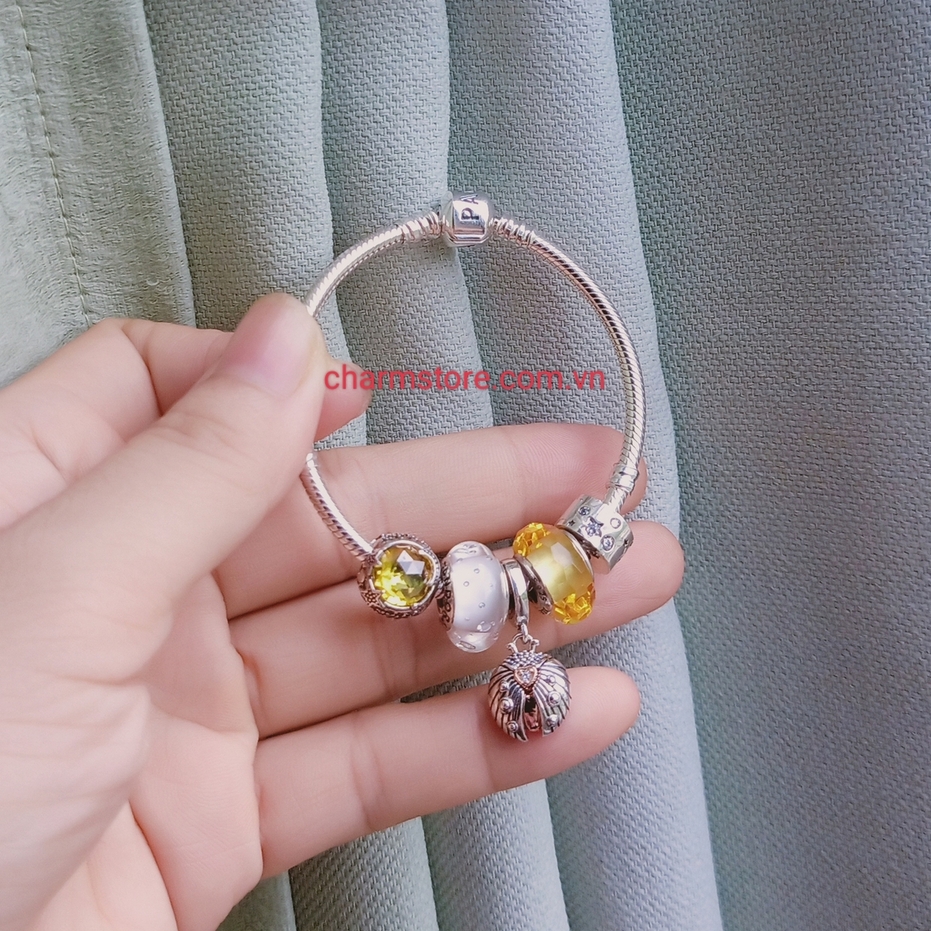 VÒNG CHARM TRÒN SAO MM ĐÁ VÀNG TREO BỌ CÁNH CỨNG