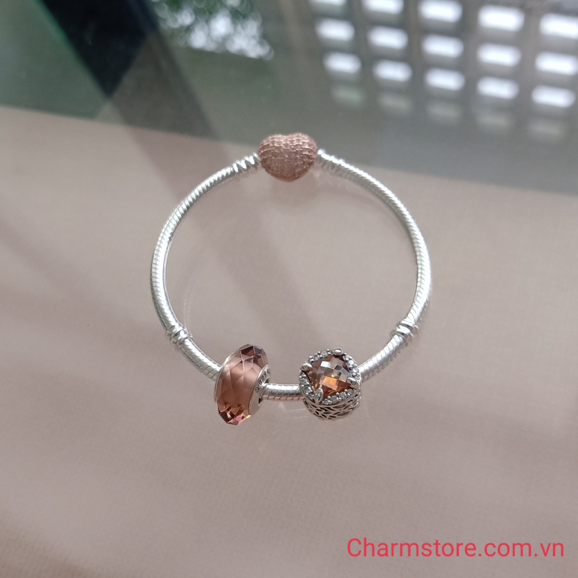 VÒNG CHARM MỆNH THỔ ĐÁ HỒNG TRÀ