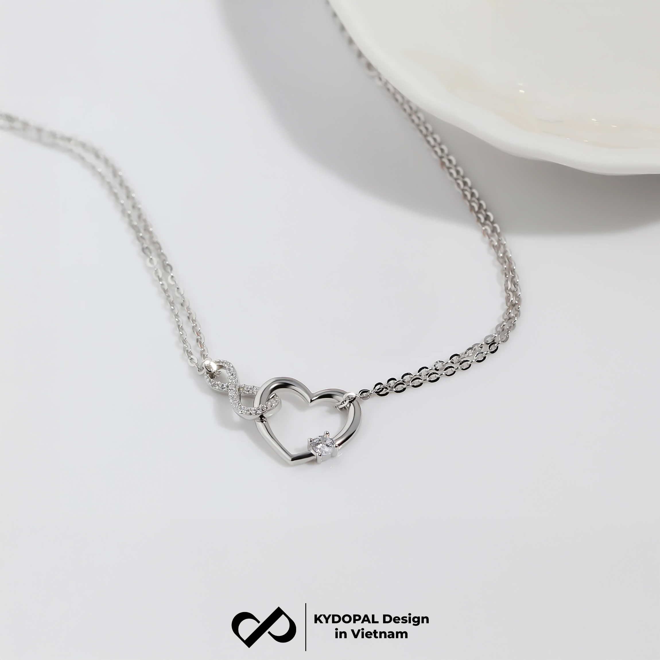 Lắc tay bạc nữ KYDOPAL trái tim cá tính kết nối vô cực nữ tính trang sức bạc 925 - PAL9C3L33