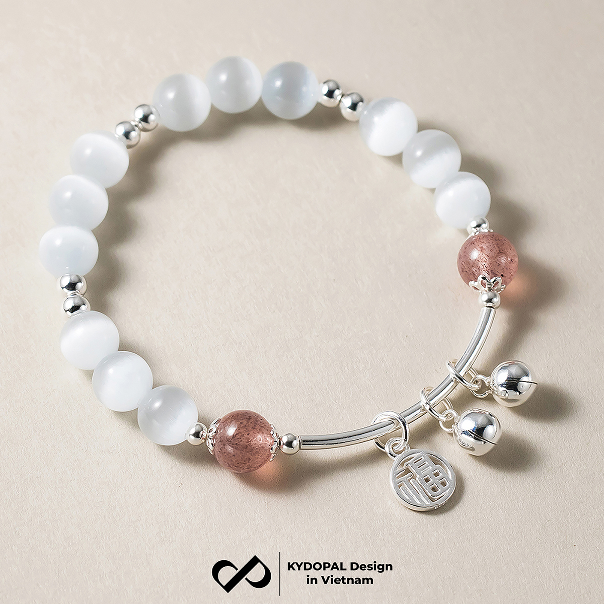 Lắc tay KYDOPAL đá mắt mèo 6mm cá tính thạch anh dâu hồng mix charm chuông đôi - PAL9C8L20
