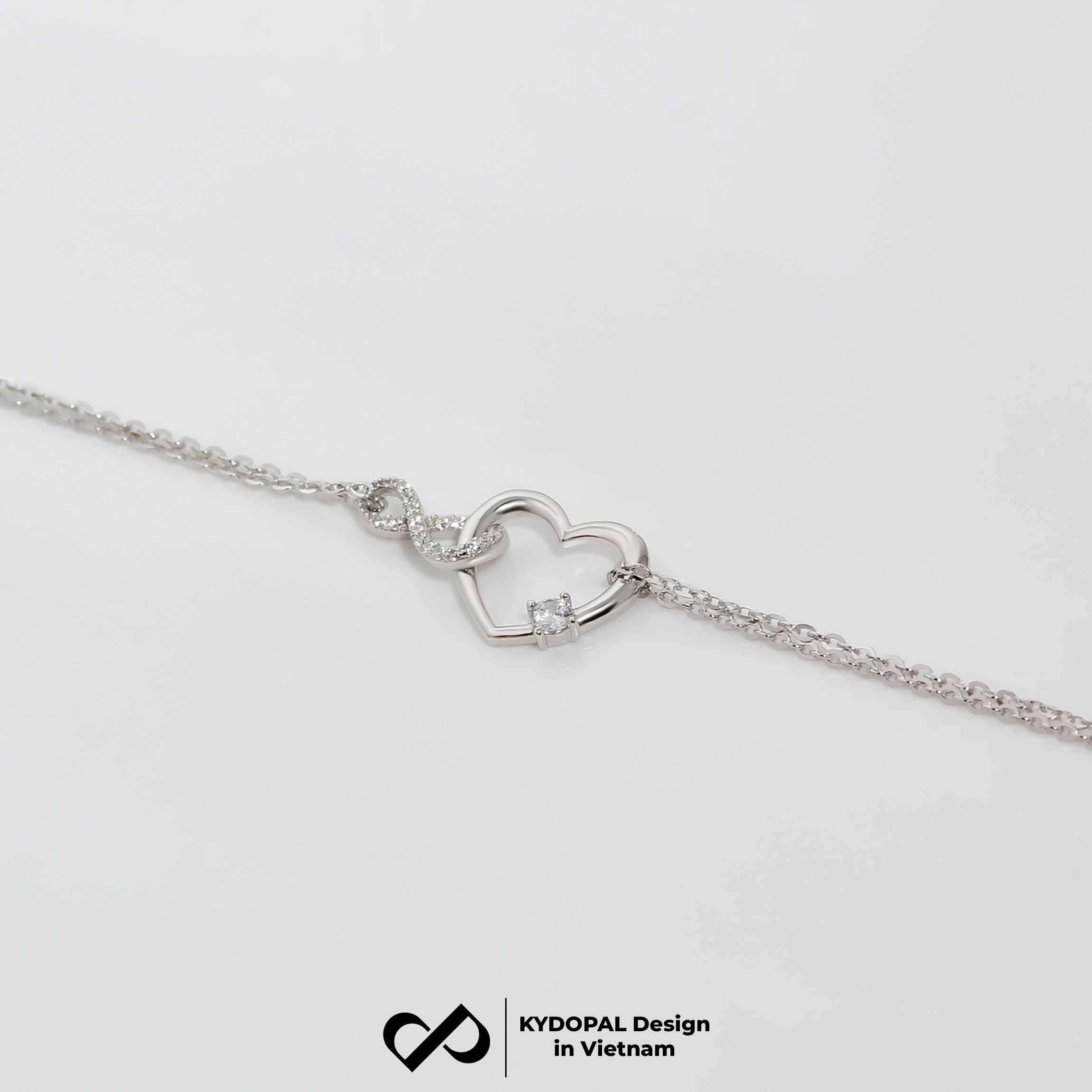 Lắc tay bạc nữ KYDOPAL trái tim cá tính kết nối vô cực nữ tính trang sức bạc 925 - PAL9C3L33