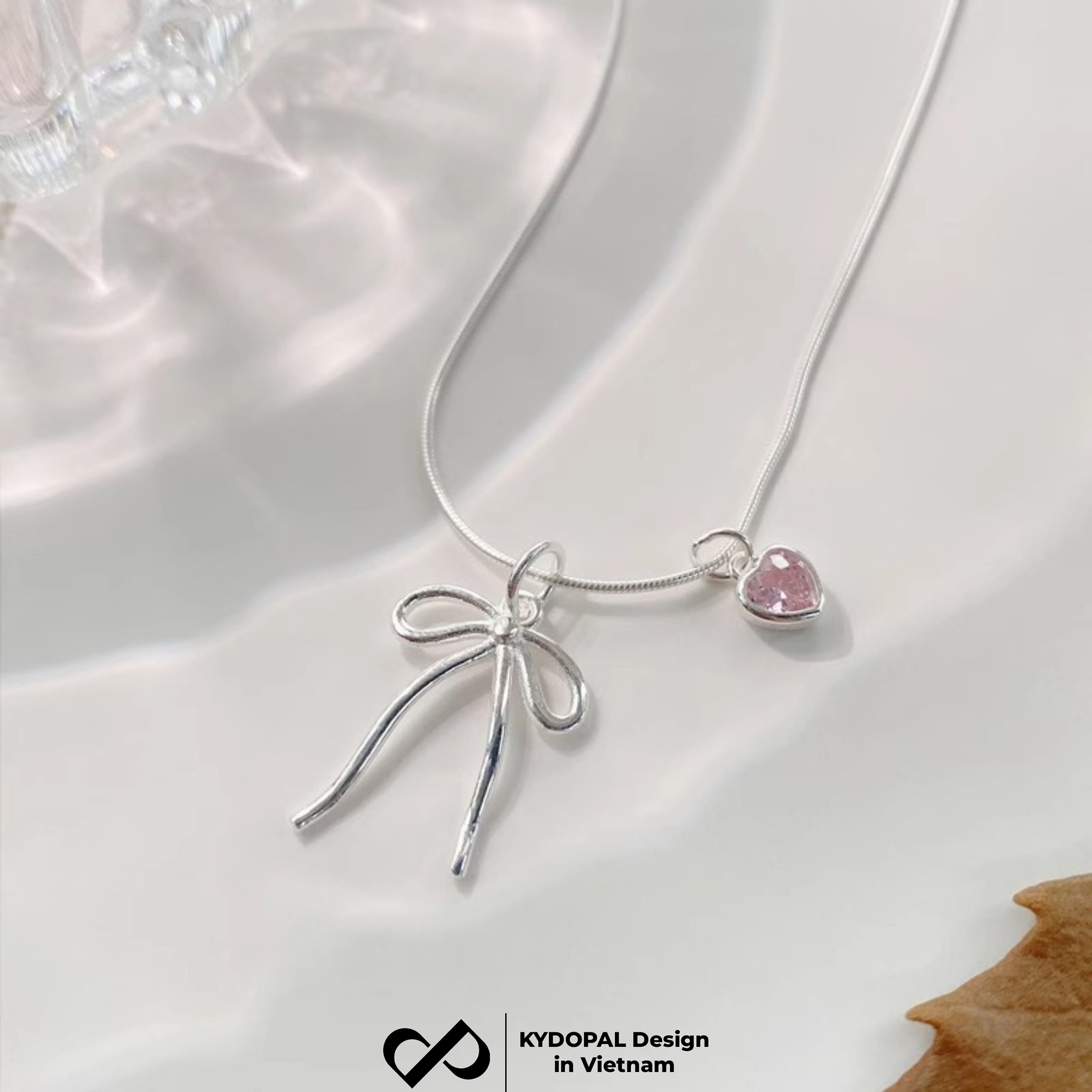 Dây chuyền bạc nữ KYDOPAL vòng cổ cá tính dây mì mặt hình nơ trơn mix đá tim hồng xinh xắn - PAL9C3C34