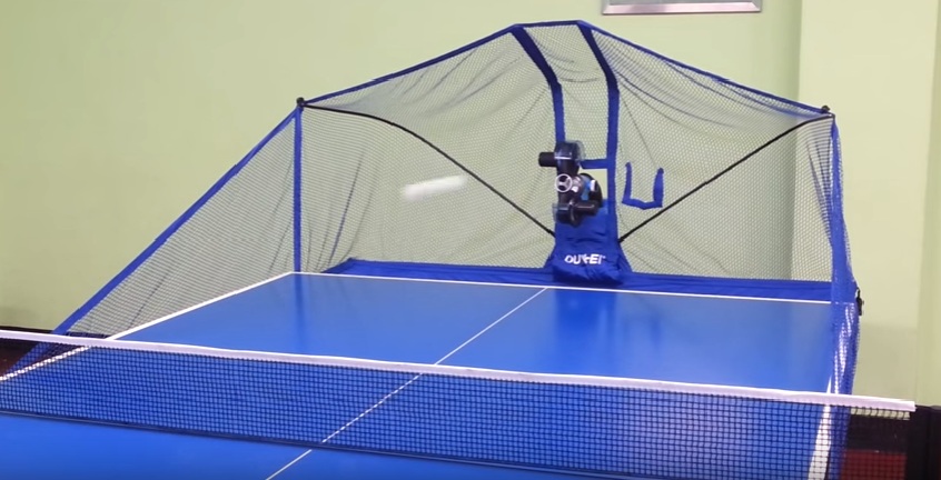 Máy bắn bóng bàn Oukei TW-2700 V1 kết hợp với bàn bóng