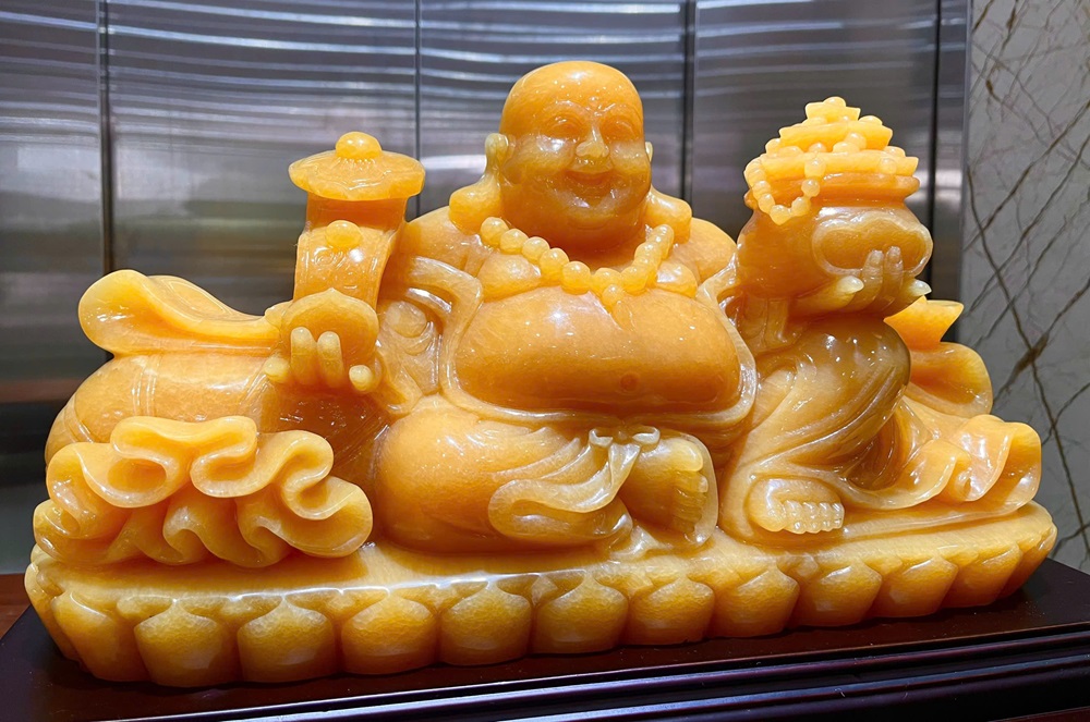 Ngài Phật Di Lặc ngồi trên túi tiền ngọc hoàng long 60cm