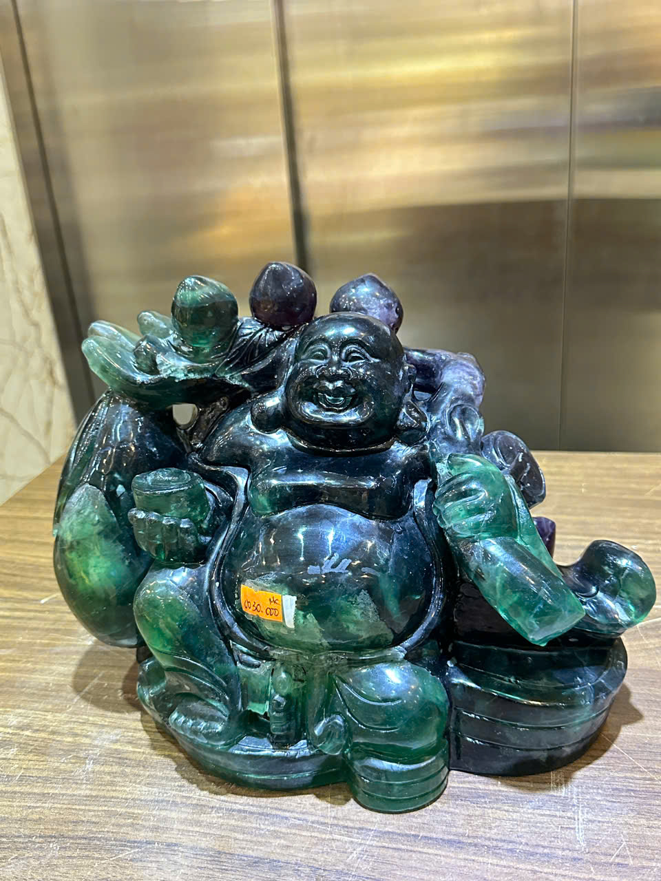 Thần tài di lặc vác tiền ngọc florit xanh 30cm