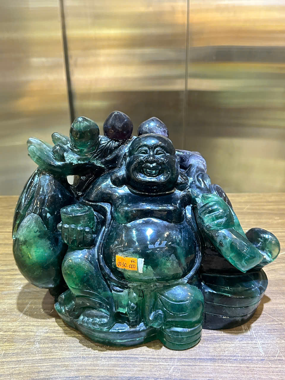 Thần tài di lặc vác tiền ngọc florit xanh 30cm