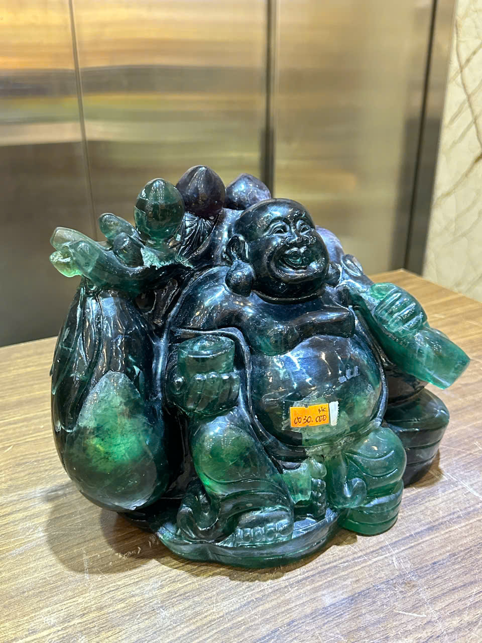 Thần tài di lặc vác tiền ngọc florit xanh 30cm