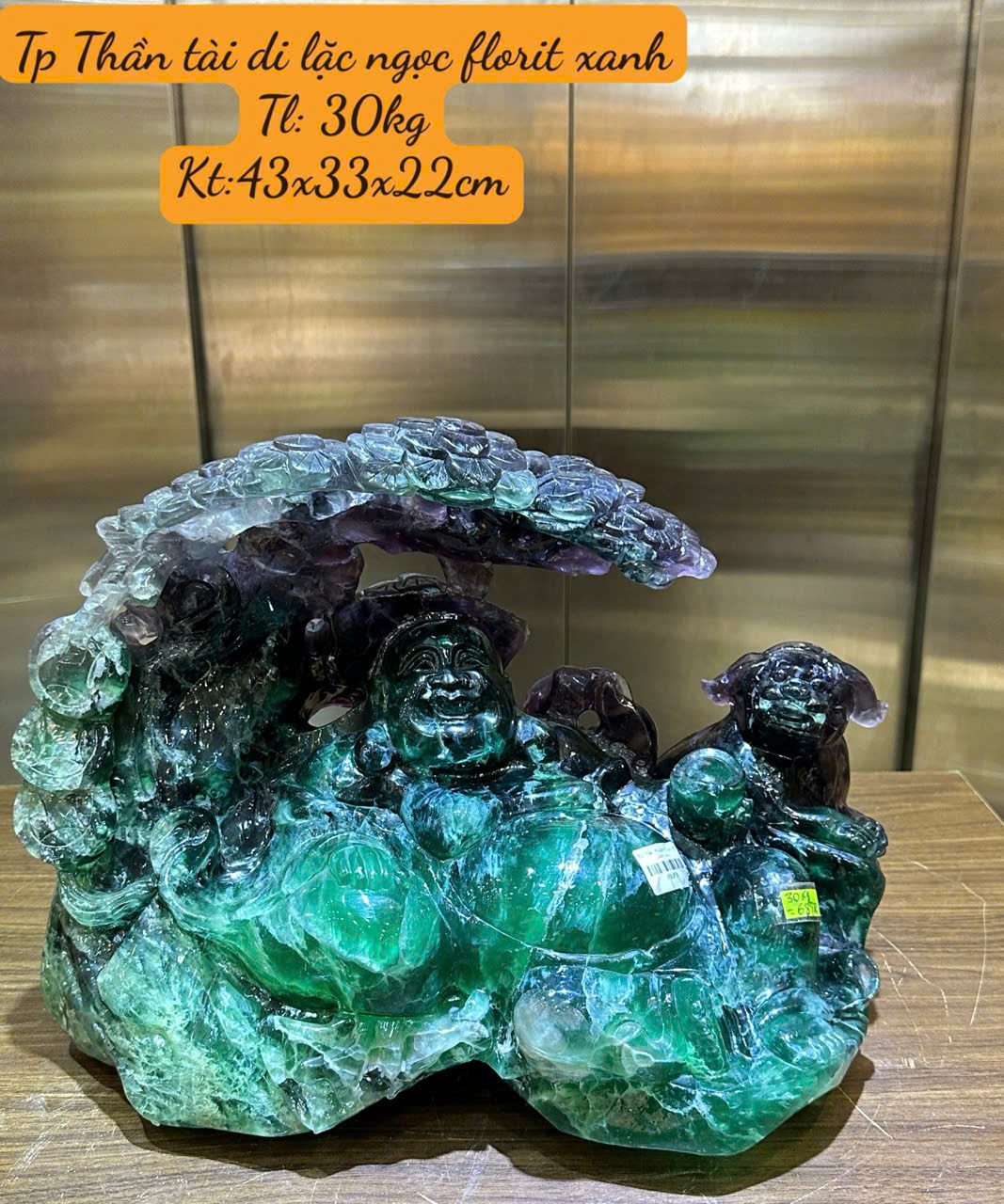 Tp Ngài thần tài di lặc thiền gốc tùng ngọc florit xanh 43cm