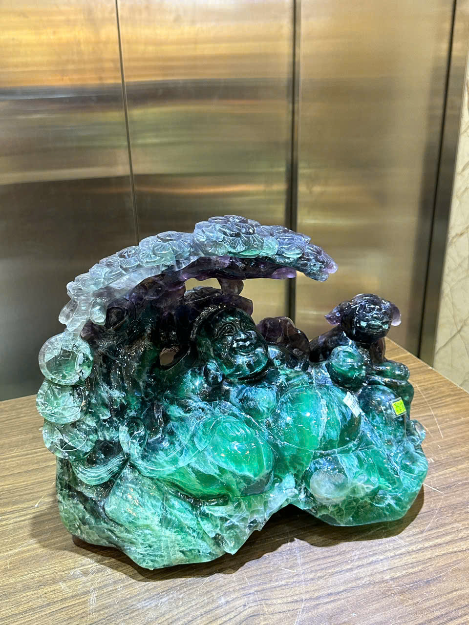 Tp Ngài thần tài di lặc thiền gốc tùng ngọc florit xanh 43cm