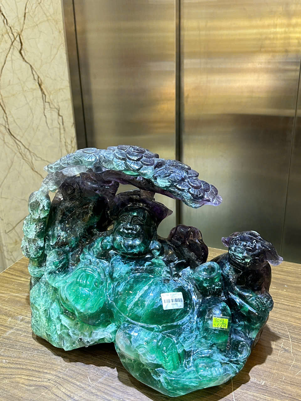 Tp Ngài thần tài di lặc thiền gốc tùng ngọc florit xanh 43cm