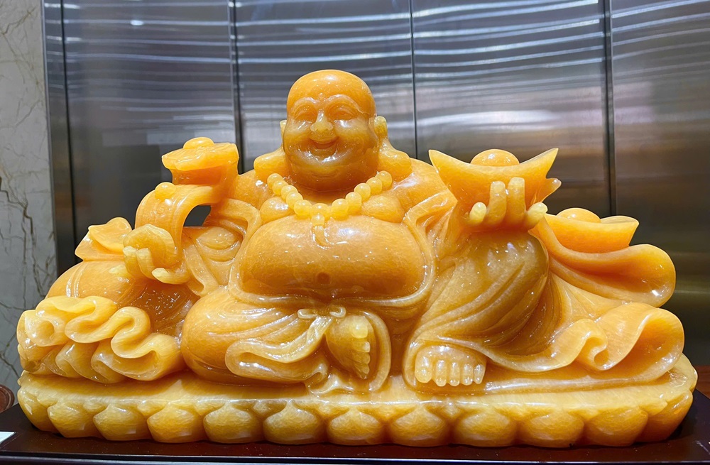 Tượng Phật Di Lặc ngồi trên túi tiền ngọc hoàng long 61cm