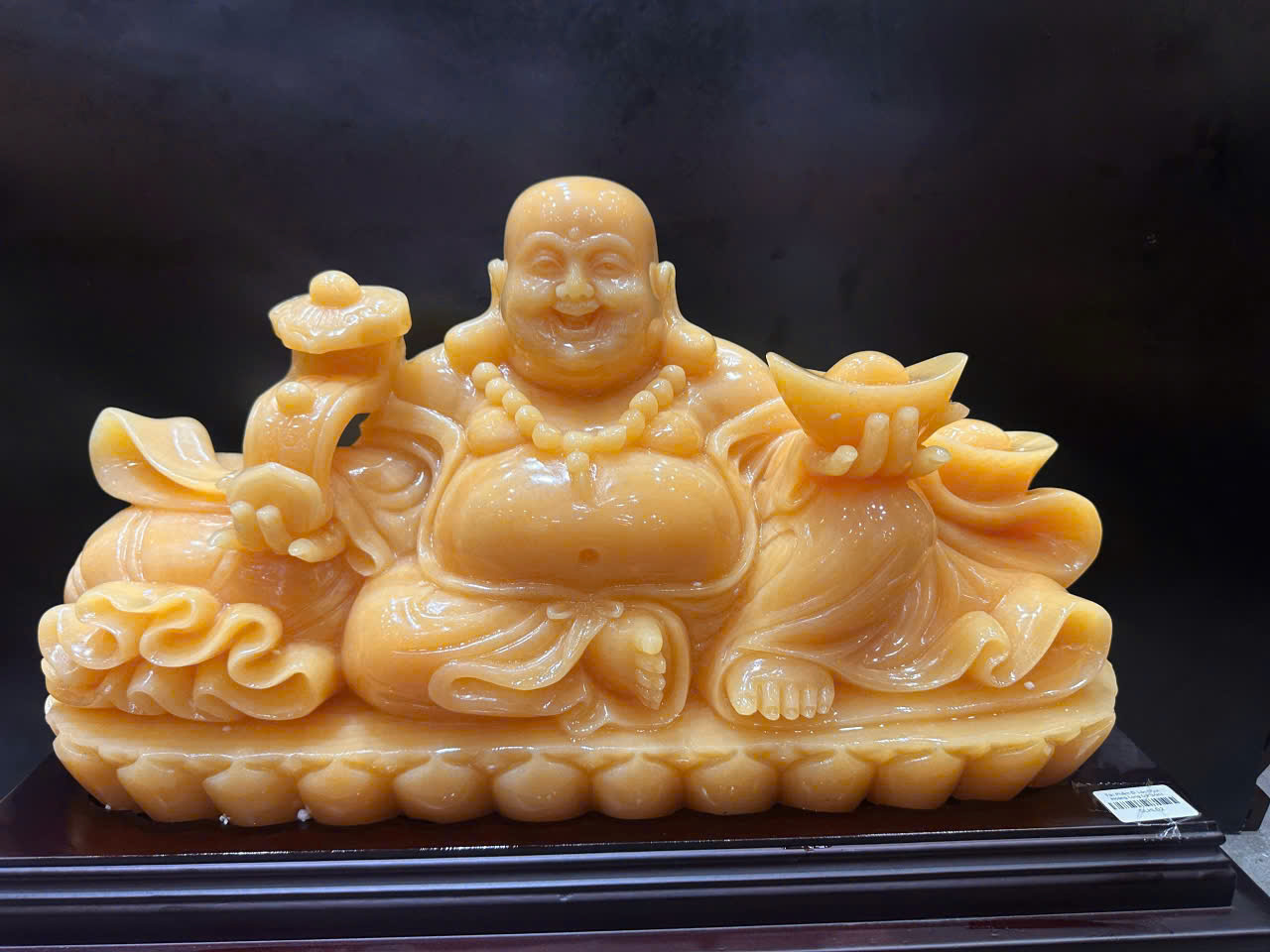 Tượng thần tài di lặc cầm gậy như ý ngọc hoàng long