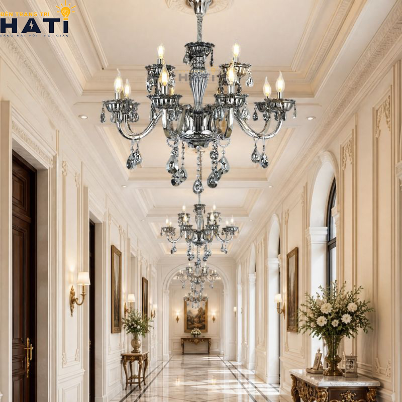 Diện mạo vương giả và cân đối của Đèn chùm pha lê Cosy 12 bóng màu vàng champagne tạo điểm nhấn quý phái cho không gian biệt thự