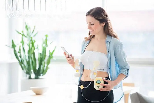 Áo rảnh tay hút sữa medela size L màu trắng và size M