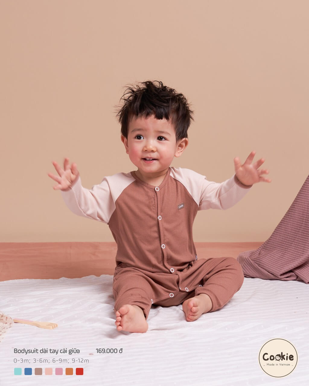 Cookie Bodysuit dài tay cài giữa