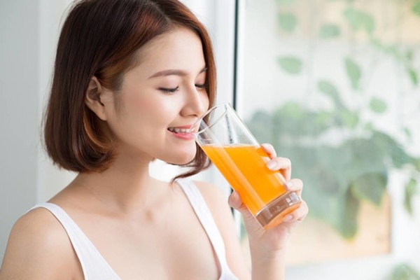 Lợi ích khi uống nước cam