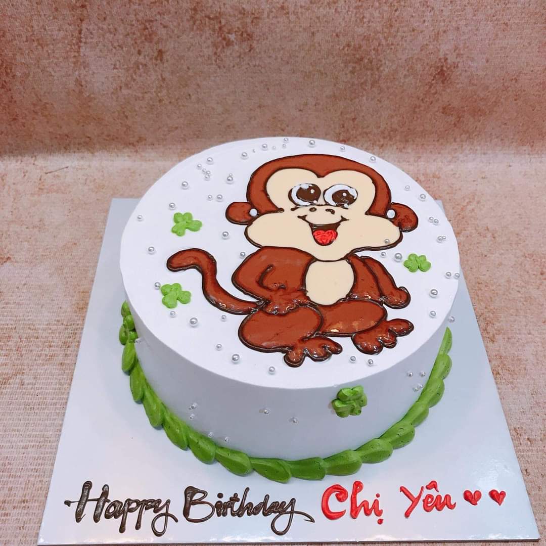 Đừng bỏ lỡ bánh sinh nhật chú khỉ cực kỳ đáng yêu của chúng tôi! Lớp kem mịn phủ trên bánh và những chiếc bánh giống như các chú khỉ dễ thương. Hình ảnh này sẽ khiến bạn muốn đến và thưởng thức nó ngay lập tức.