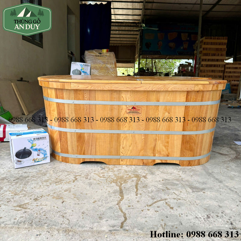 Bồn tắm gỗ xông hơi Pơ Mu dáng dài bo viền.