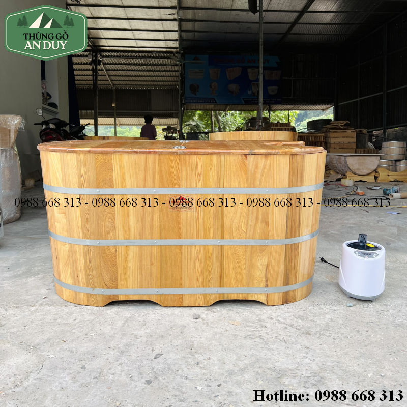 Bồn tắm gỗ Pơ Mu xông hơi dáng oval thiết kế nằm tự nhiên