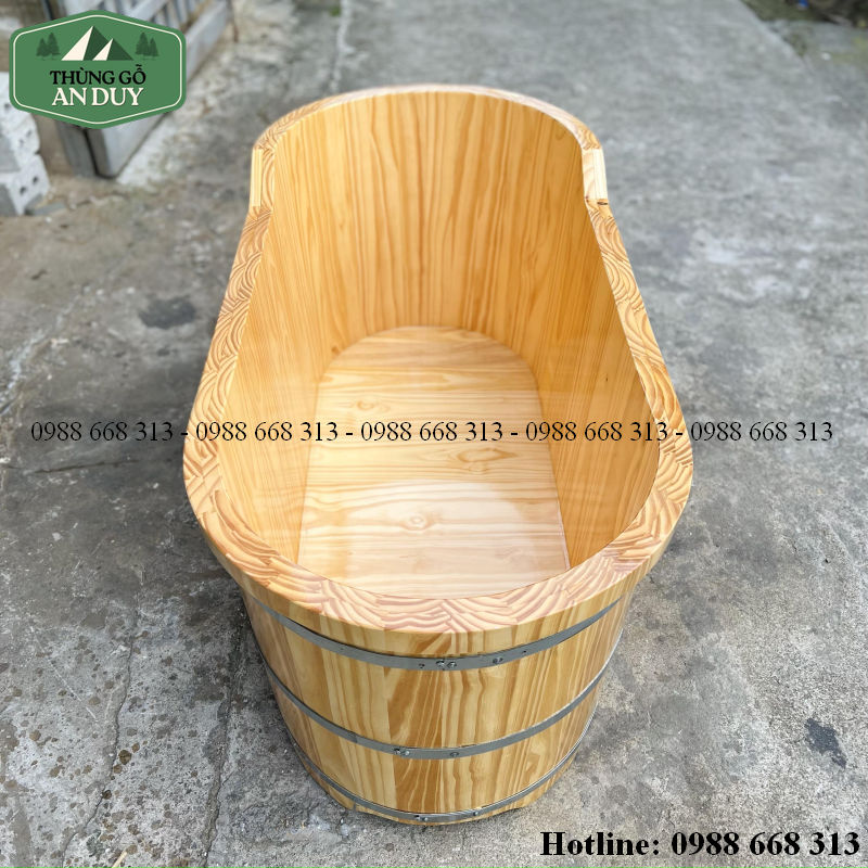 Van xả nước và hệ thống thoát nước dưới đáy bồn tắm gỗ