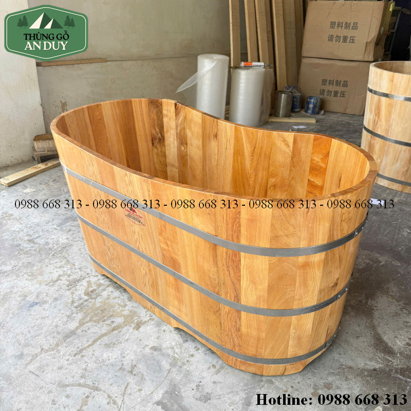 Bồn tắm gỗ thông dáng oval kết hợp ngâm nước ấm và thảo dược