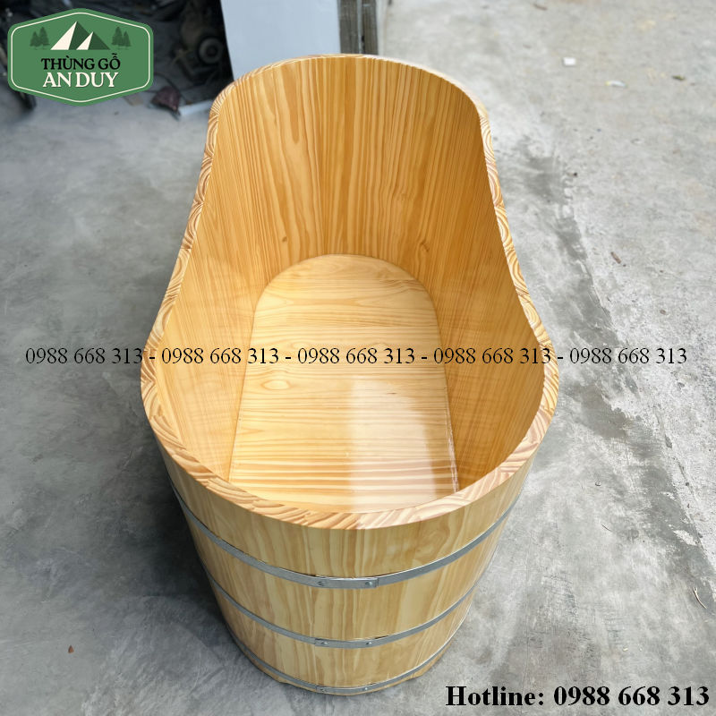 Bồn tắm gỗ thông dáng oval kết hợp ngâm nước ấm và thảo dược