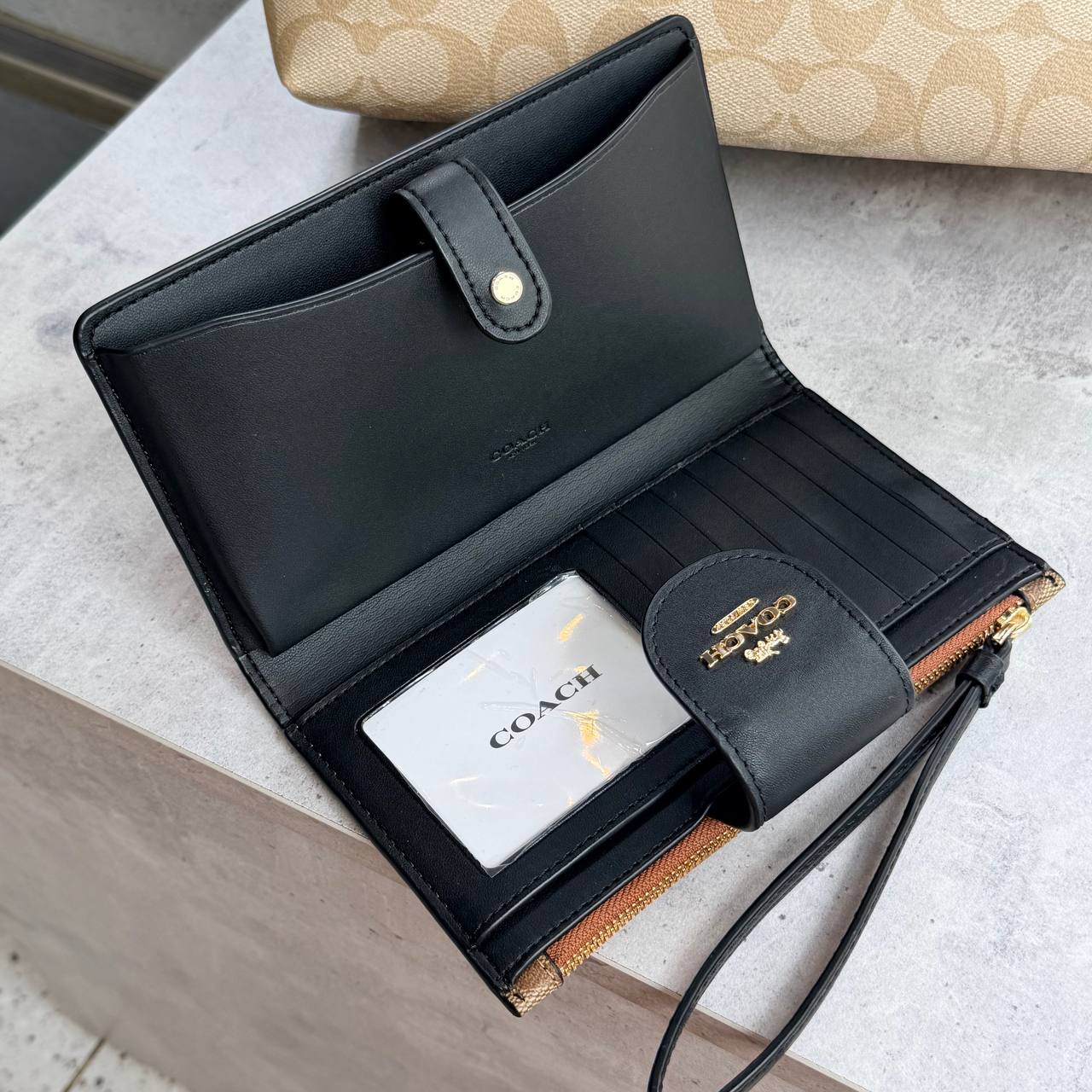 Ví Nữ Coach Phone Wallet In Colorblock Signature Canvas CW780 Màu Nâu