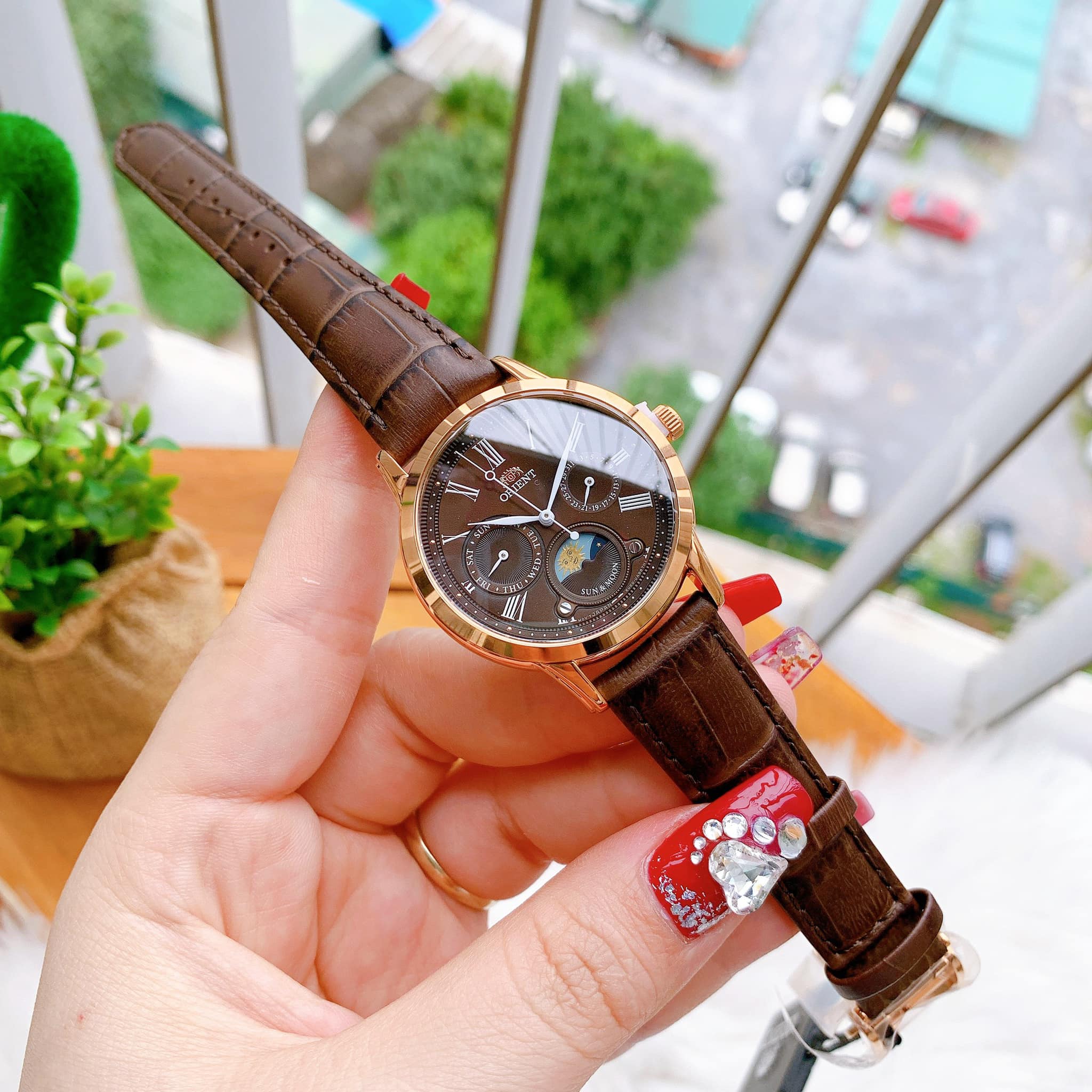 ĐỒNG HỒ NỮ ORIENT SUN AND MOON BROWN SUNRAY DIAL LADIES RA-KA0002Y10B