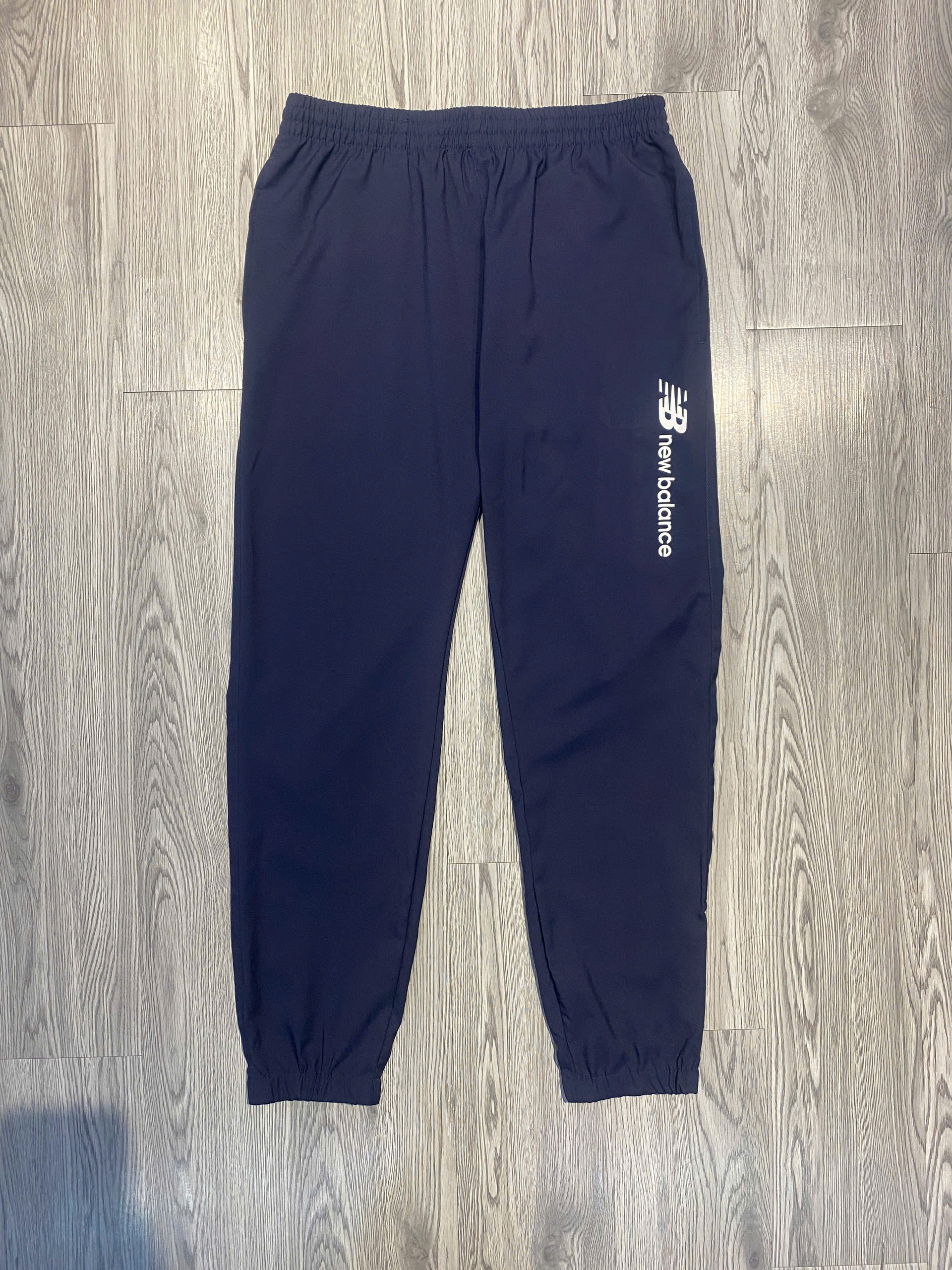 Quần Dài Chính Hãng - New Balance woven track pants Joggers  