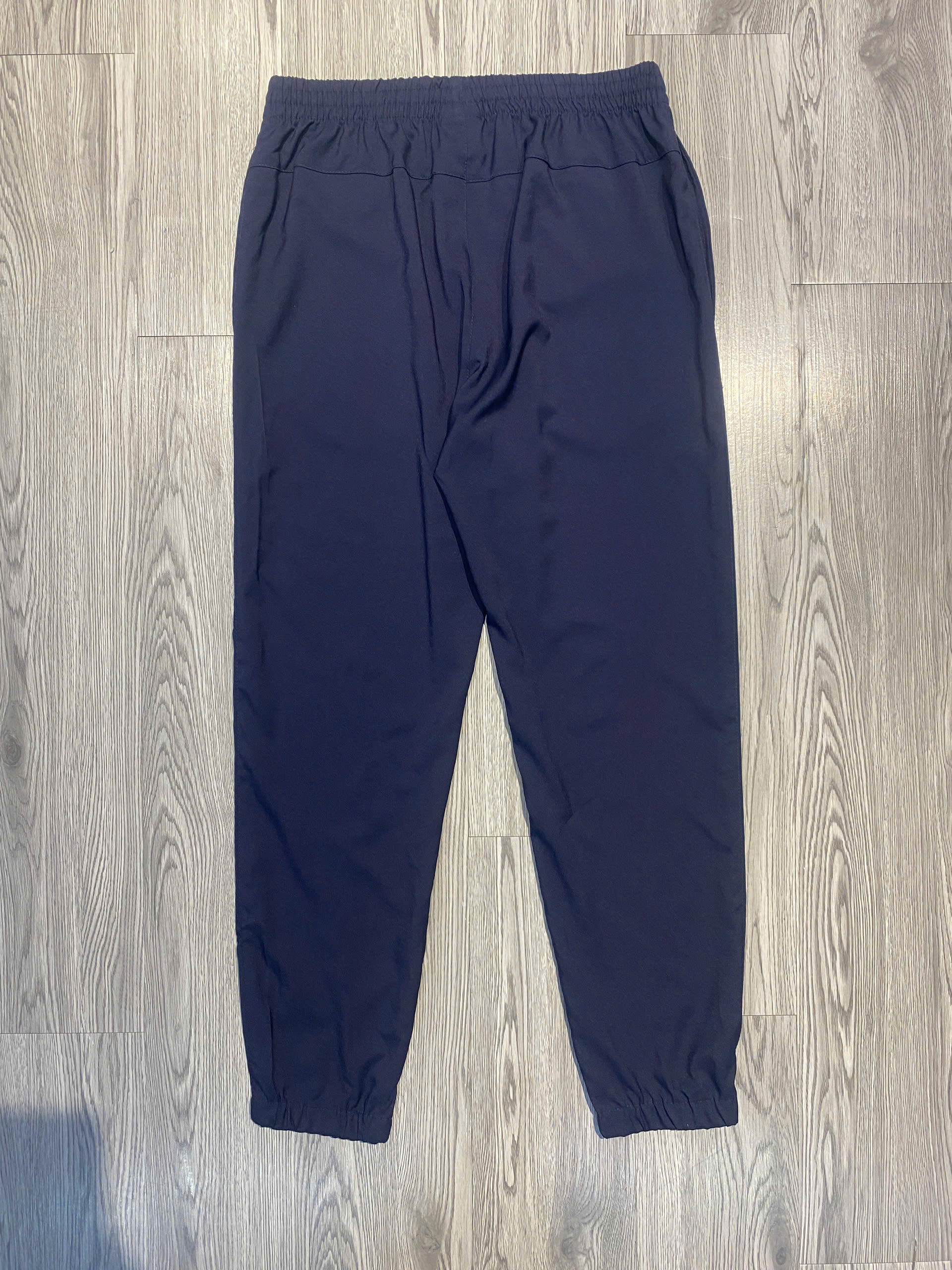 Quần Dài Chính Hãng - New Balance woven track pants Joggers  
