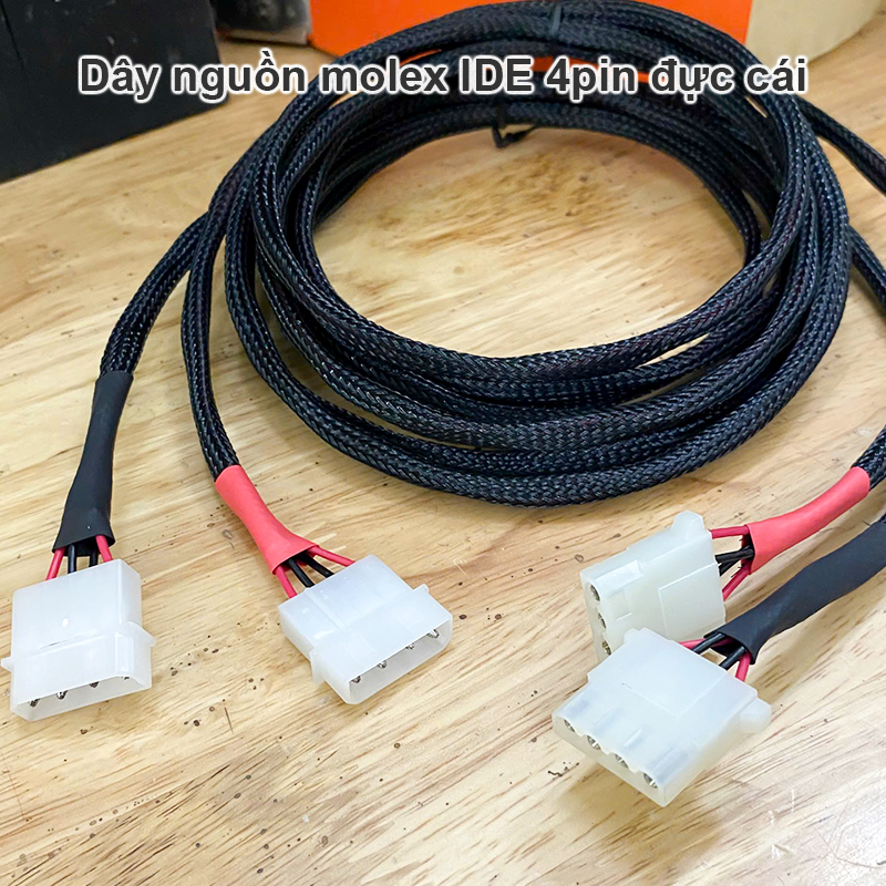 Old standard IDE 4-pin male-female power cord for computers with hard drives and DVD drives.