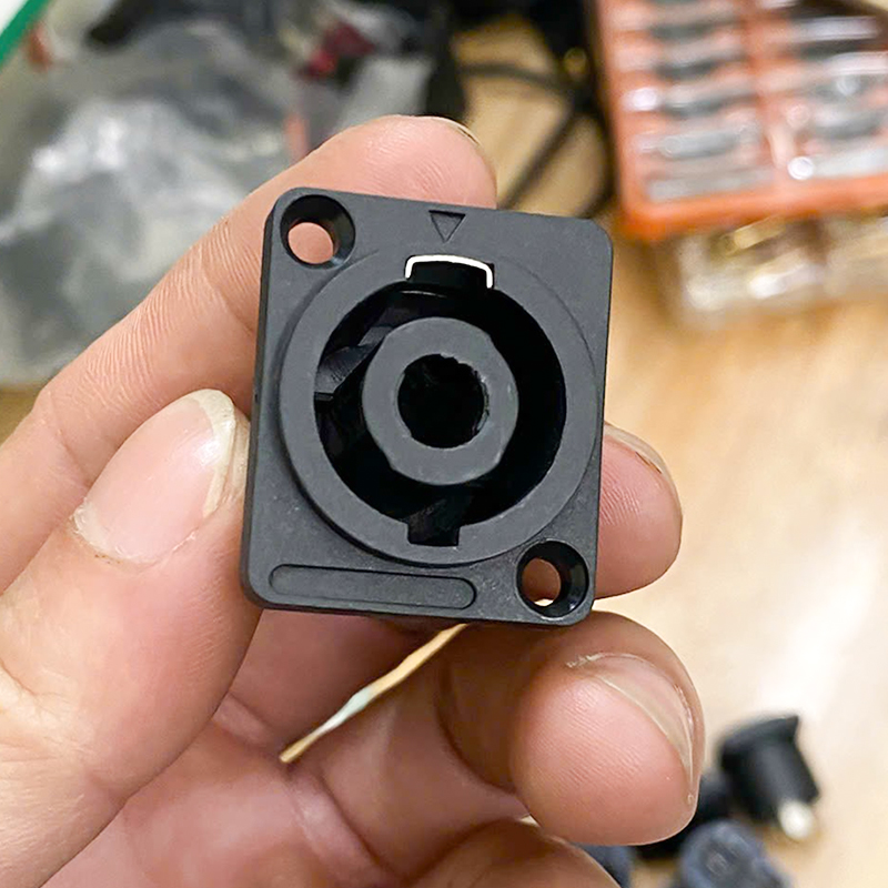 Female speaker socket for mounting into cabinet or equipment housing.