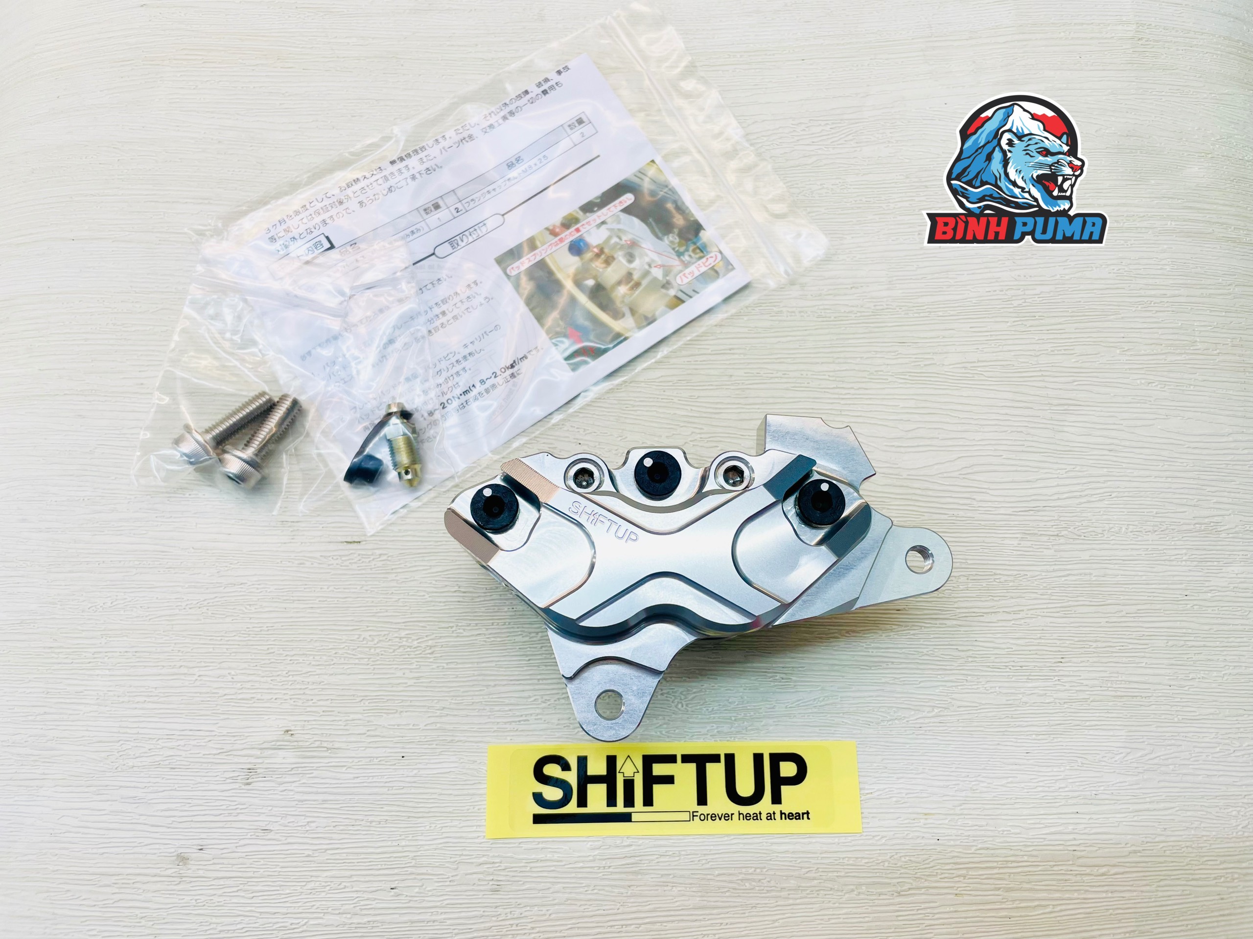 Heo dầu Shift Up 4 Pis đối xứng màu bạc