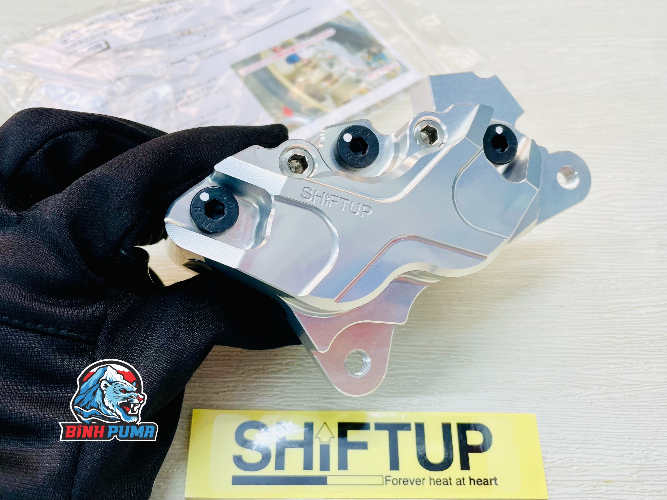 Heo dầu Shift Up 4 Pis đối xứng màu bạc