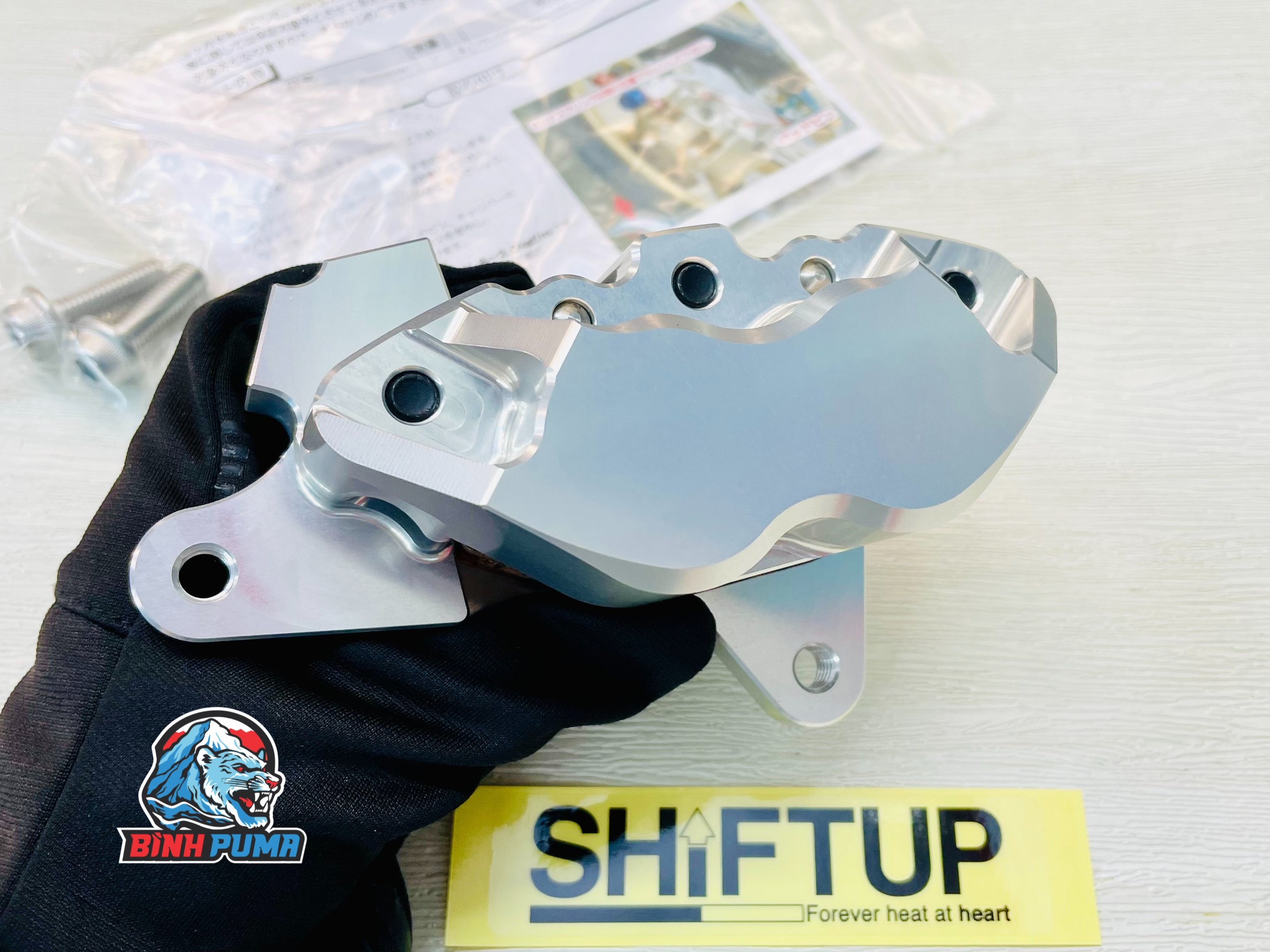 Heo dầu Shift Up 4 Pis đối xứng màu bạc