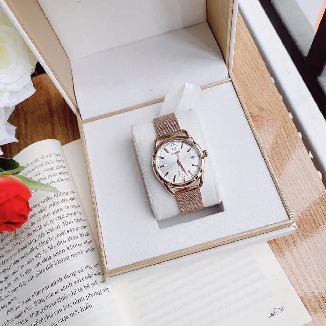 Đồng hồ citizen mặt trắng dây thép case 34mm