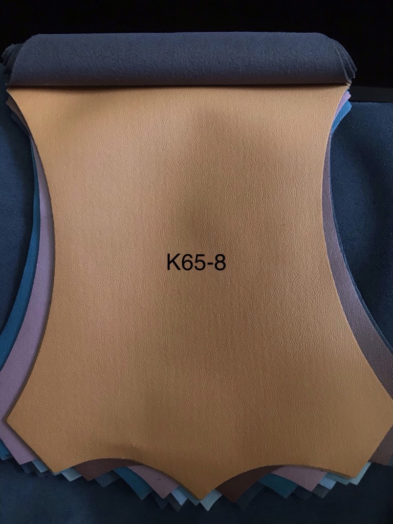 KITA-K65-8:-MÀU CAM VẢI GIẢ DA VÂN TRƠN